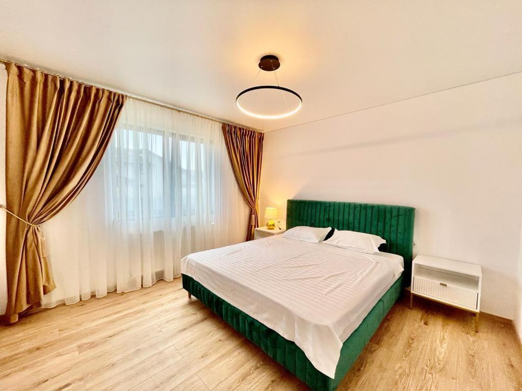 Residence Odaile #2 โอโตเปนี ภายนอก รูปภาพ